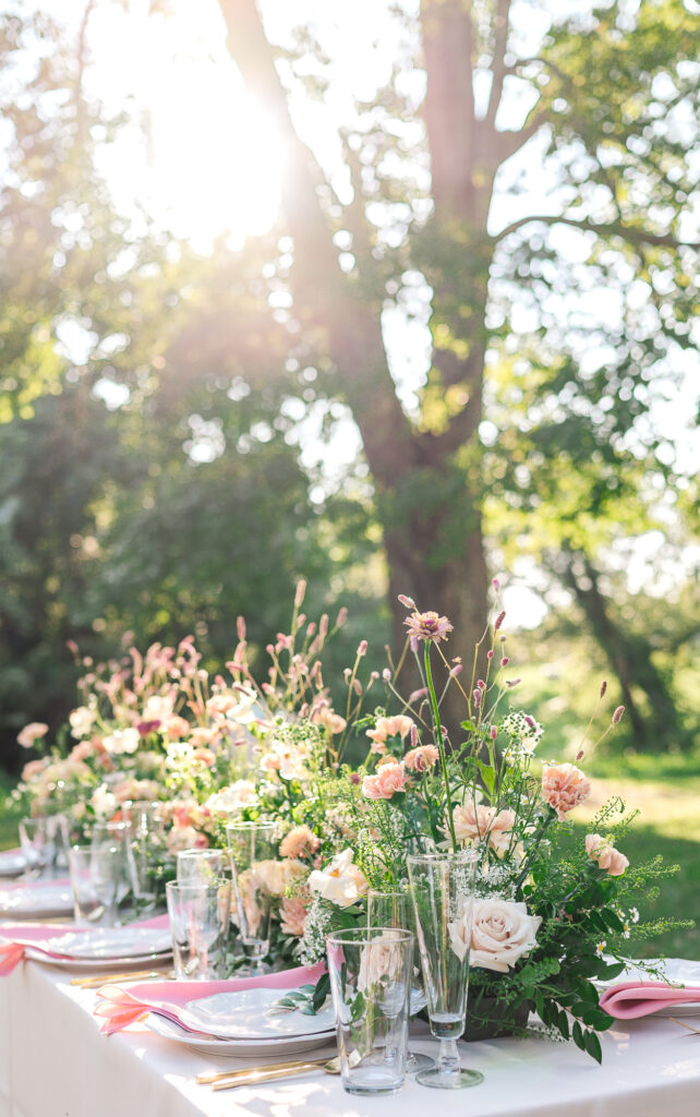Beautiful floral arrangements at sunset by JoLynn Photography