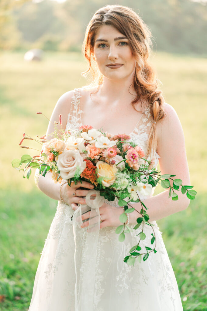 A dashing redheaded bride during a Raleigh bridal portrait sunset session by JoLynn Photography
