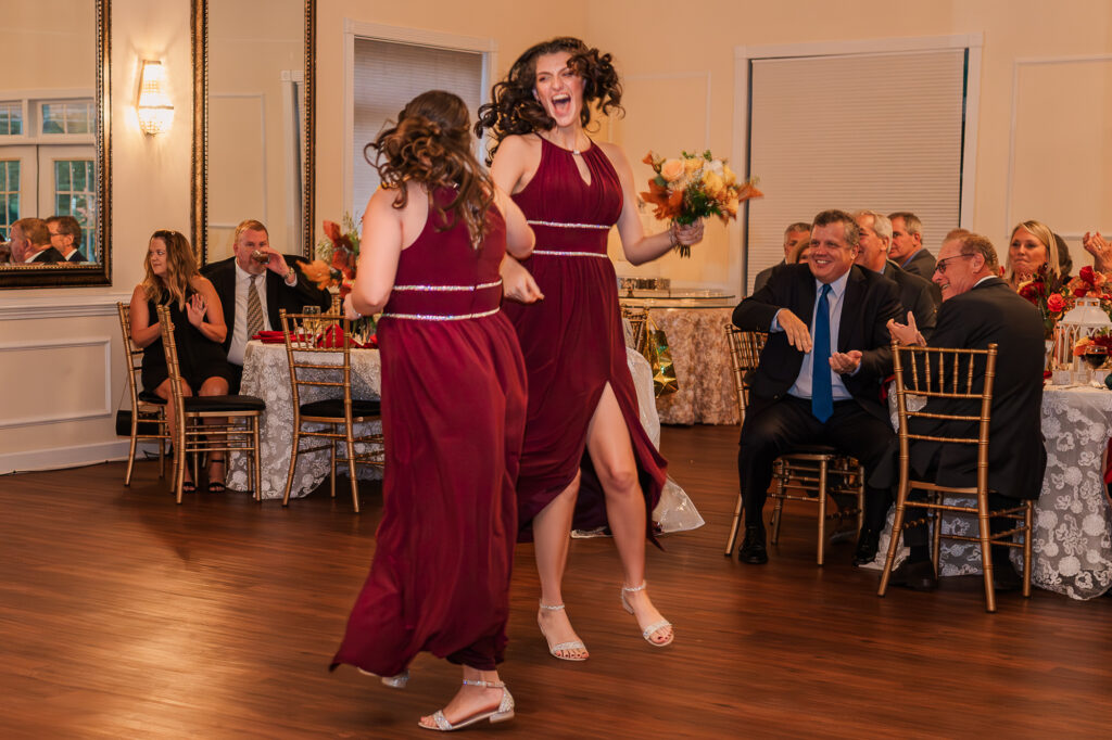 Bridesmaids dancing on the dance floor at the Hudson Manor