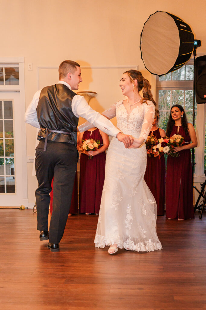 A bride and groom having their first dance at the Hudson Manor