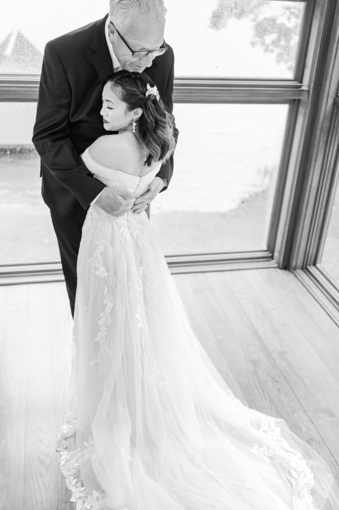 A father and his daughter on her wedding day at Lake Gaston by JoLynn Photography