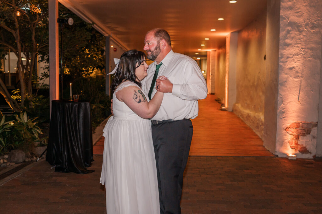 A father and his daughter on her wedding day sharing a dance at The Atrium Wedding Venue