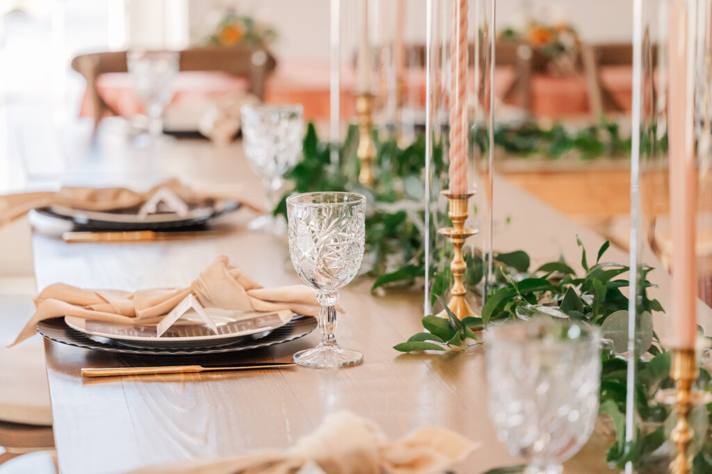 A warm tablescape at a Wake Forest Wedding venue by JoLynn Photography