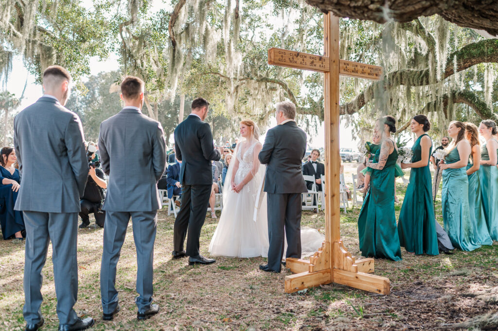 A couple being united in marriage at a Savannah Destination Wedding