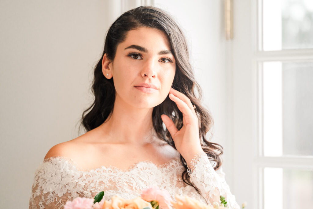 Bridal portraits with a wedding bouquet by JoLynn Photography