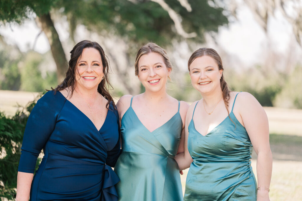 Two bridesmaids and the Mother of the Bride at a Savannah Destination Wedding by JoLynn Photography