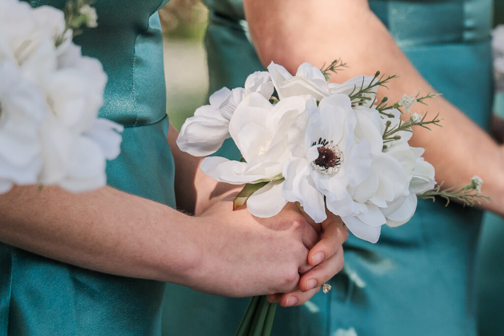 A wedding bouquet at Agapae Oaks by JoLynn Photography