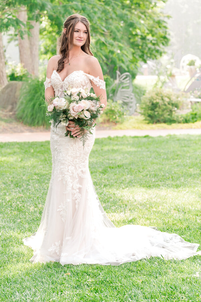 A brunette bride on her spring wedding day in Raleigh by JoLynn Photography