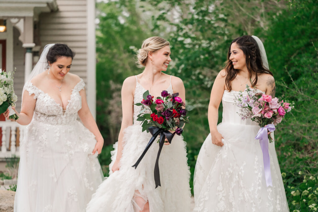 Three brides enjoying their wedding planning services from a Wake Forest wedding planner