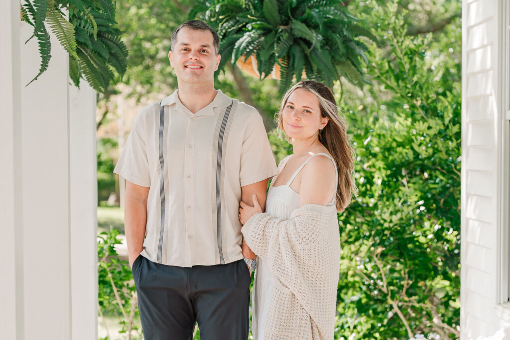 Smiles and porch hanging ferns by JoLynn Photography