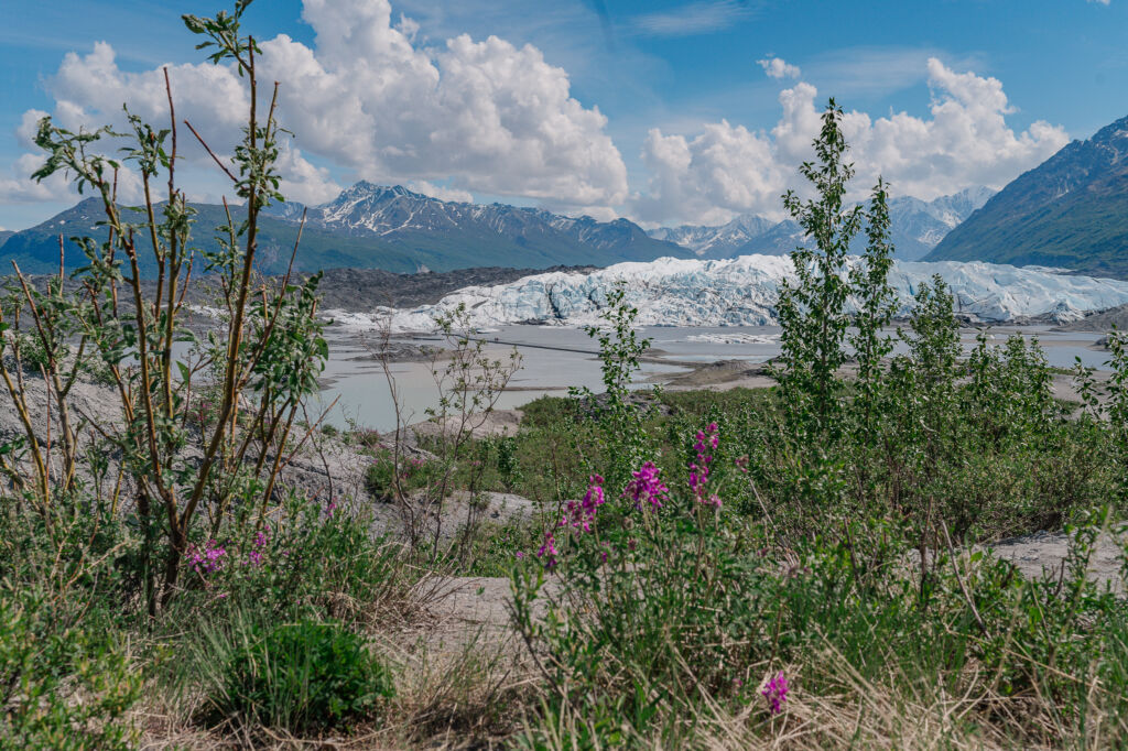 A couple enjoying their destination wedding on Matanuska Glacier for their Alaskan Glacier Wedding by destination wedding photographer, JoLynn Photography