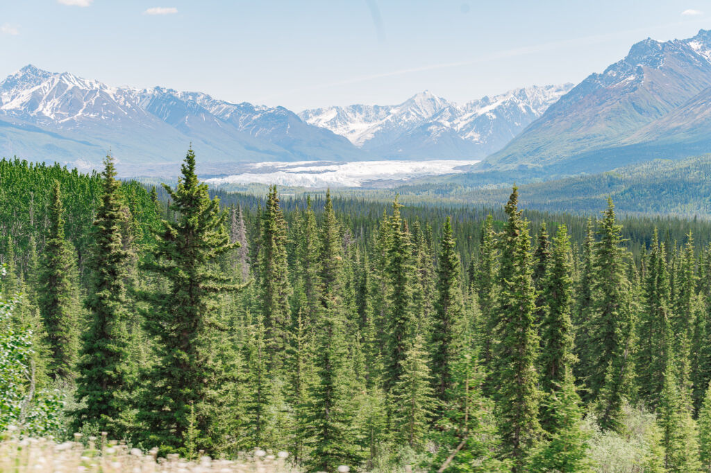 A couple enjoying their destination wedding on Matanuska Glacier for their Alaskan Glacier Wedding by destination wedding photographer, JoLynn Photography