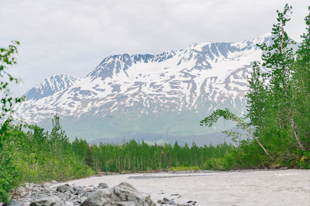 A couple enjoying their destination wedding on Matanuska Glacier for their Alaskan Glacier Wedding by destination wedding photographer, JoLynn Photography