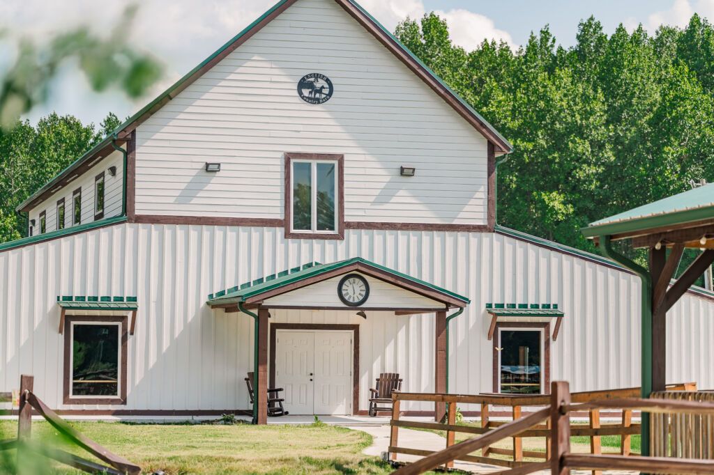 A close up of the English Country Barn on a warm summer June day by JoLynn Photography