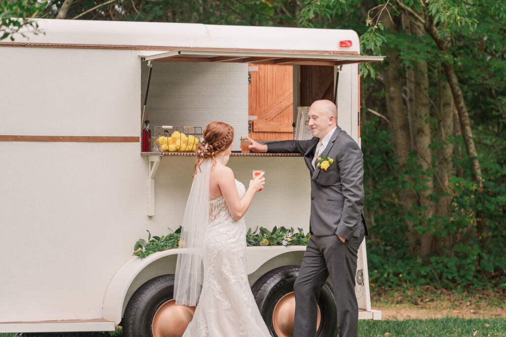 A loving couple enjoying their Winston-Salem wedding in the illuminating countryside at sunset