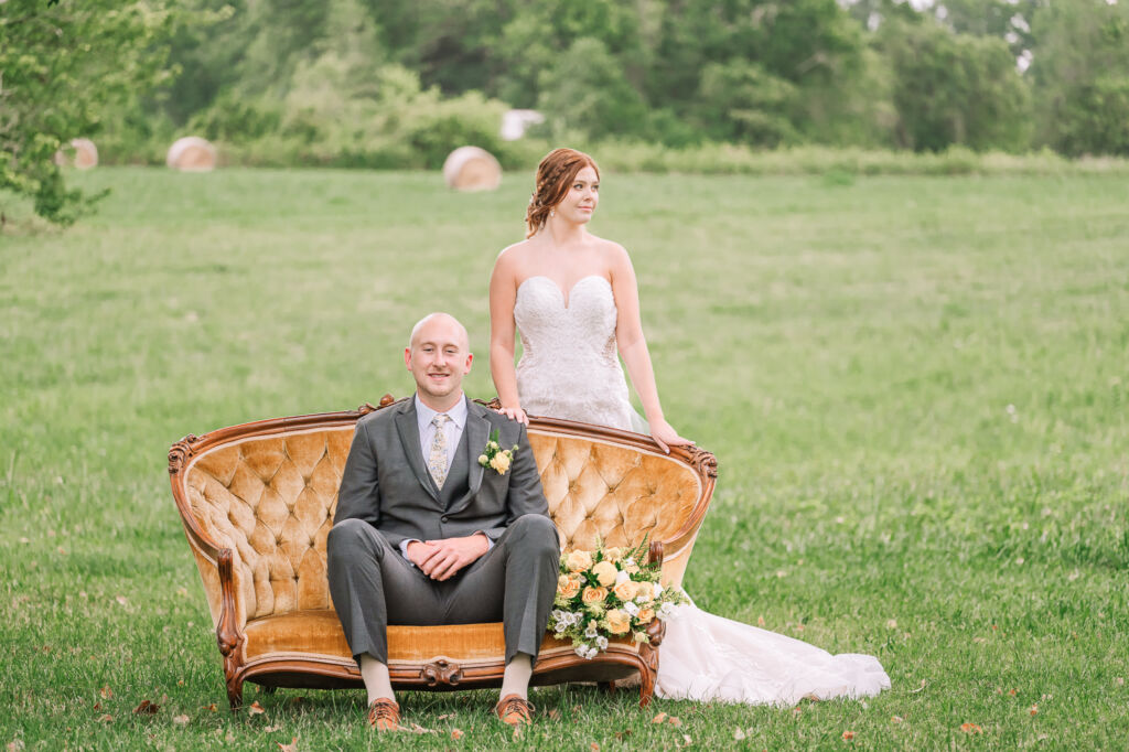 A loving couple enjoying their Winston-Salem wedding in the illuminating countryside at sunset