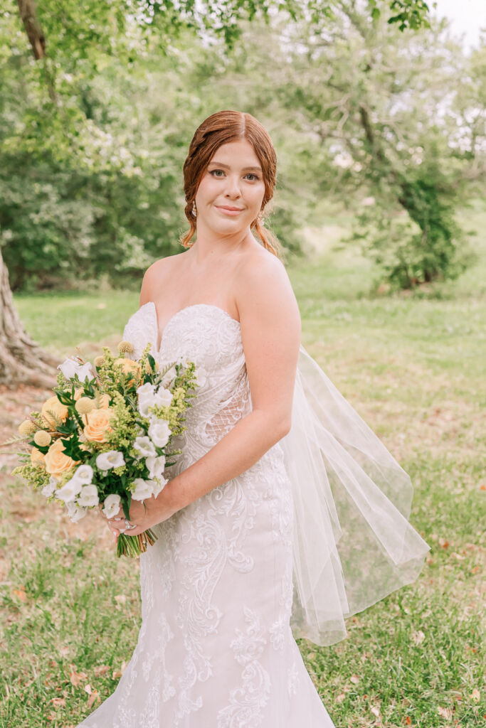 A loving couple enjoying their Winston-Salem wedding in the illuminating countryside at sunset