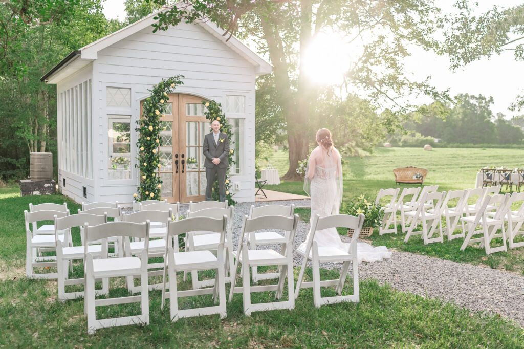 A loving couple enjoying their Winston-Salem wedding in the illuminating countryside at sunset