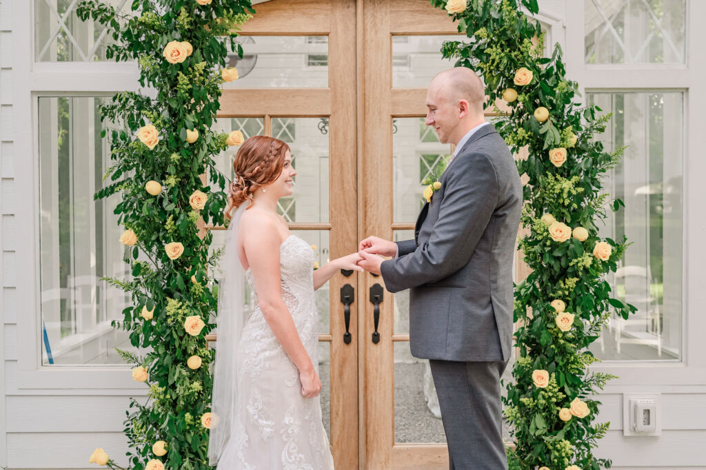 A loving couple enjoying their Winston-Salem wedding in the illuminating countryside at sunset