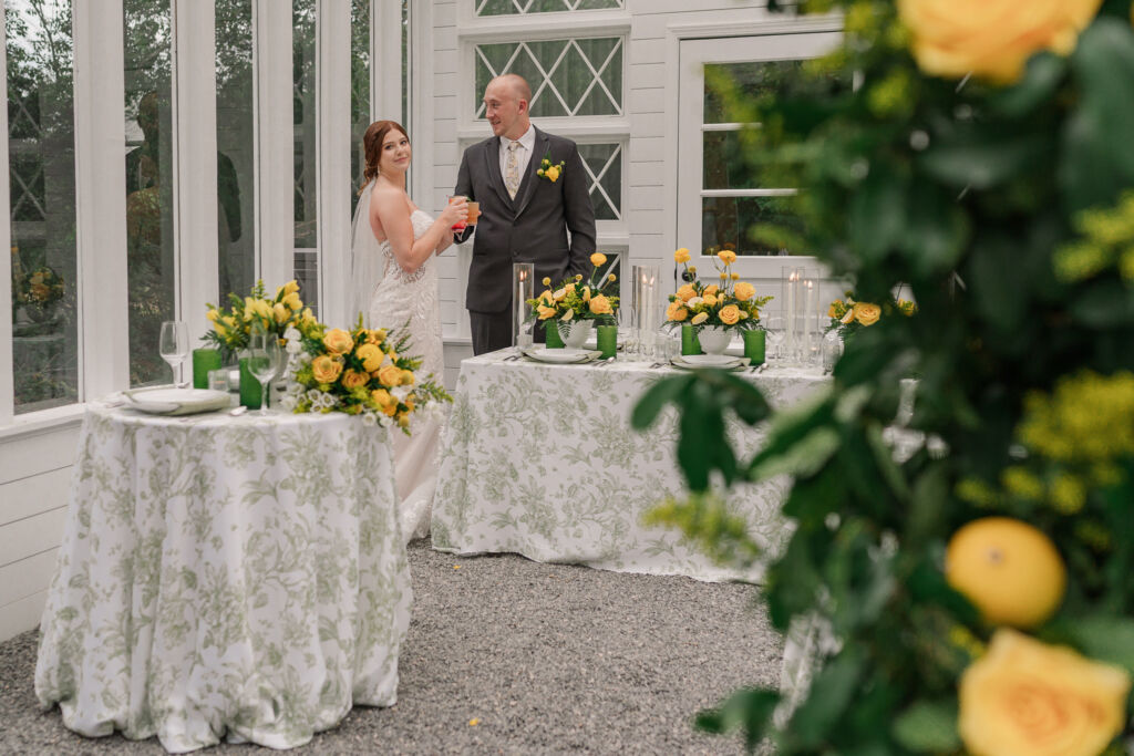 A loving couple enjoying their Winston-Salem wedding in the illuminating countryside at sunset