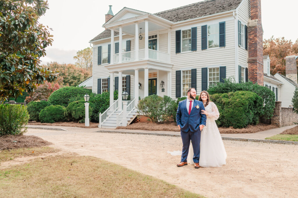 A happily married couple during their fall wedding getting couple's portraits at sunset at The Sutherland by JoLynn Photography