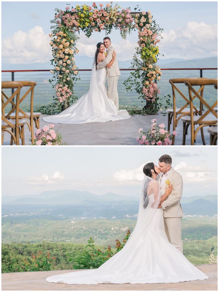 A happy couple celebrating their love in the summer air overlooking stunning mountain views at The Trillium with yellow flowers by JoLynn Photography