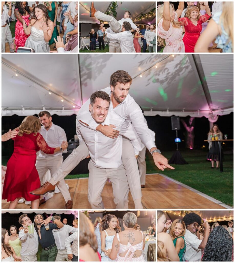 A fun wedding party enjoying their wedding reception at an estate wedding venue in North Carolina by JoLynn Photography