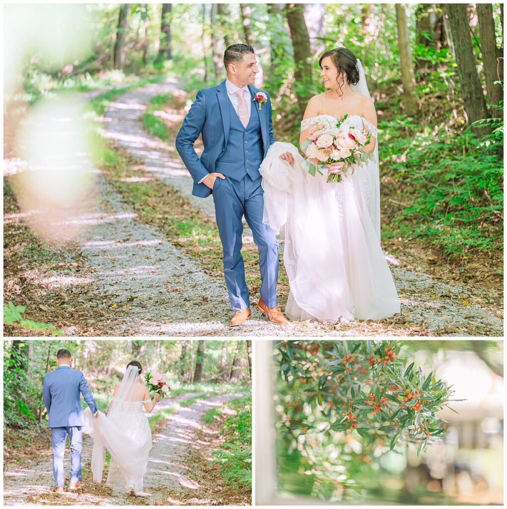 A glowing bride and her husband in a blue suit walking a private pathway in the glowing woods at Waverly Estate by JoLynn Photography