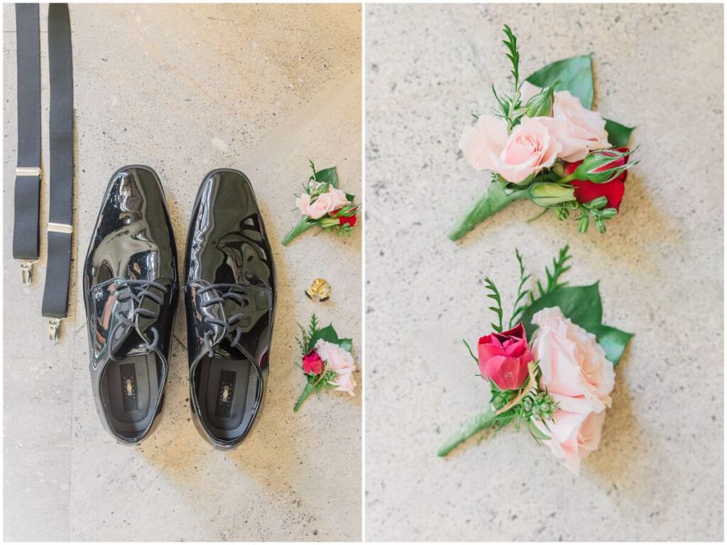 A grooms wedding details of shoes and his boutineer 