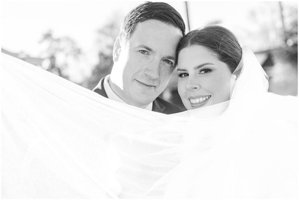 Beautiful wedding portraits of a happy couple during their Cary wedding at The Prestonwood Country Club by JoLynn Photography