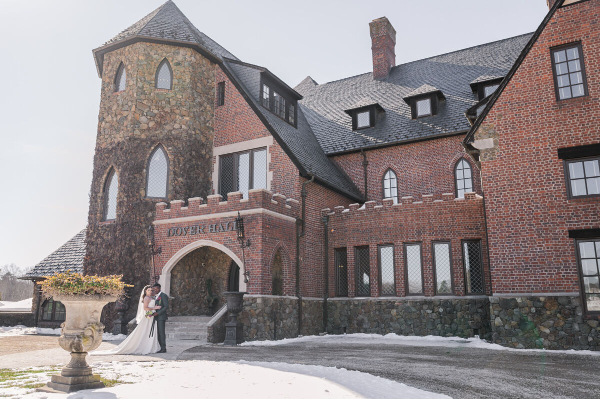 A winter editorial at Dover Hall Estate with a stunning couple with warm winter florals by JoLynn Photography