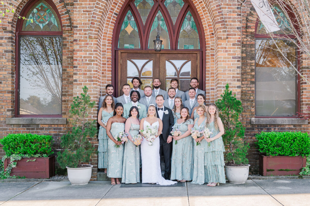 A stunning spring wedding full of soft romantic florals with rich downtown tones during a Brooklyn Arts Center Wedding by JoLynn Photography