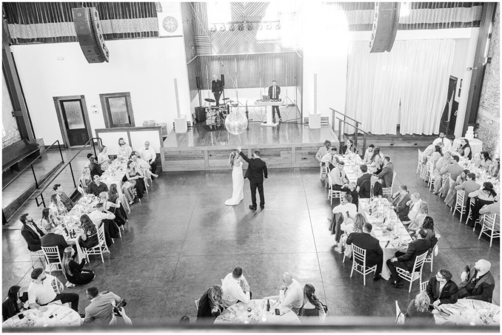 A loving bride and groom sharing a first dance during their Brooklyn Arts Center Wedding by JoLynn Photography