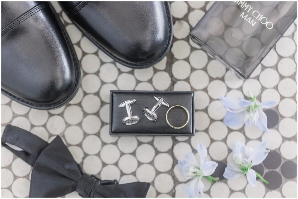 Iconic black and white groom details