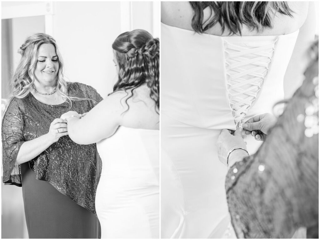 A glowing brunette bride getting ready on her wedding day at The Barn at Blue Sky Farm with her mom by JoLynn Photography