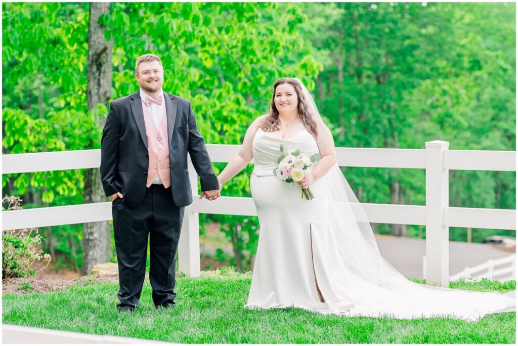 A happy couple during golden hour portraits at The Barn at Blue Sky Farm by JoLynn Photography