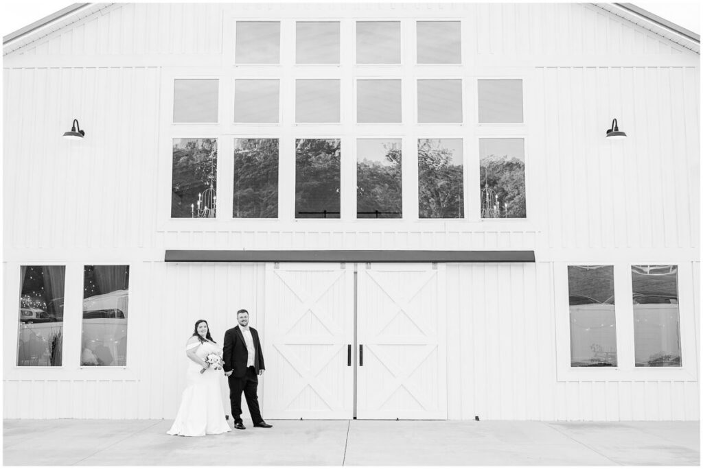 A happy couple during golden hour portraits at The Barn at Blue Sky Farm by JoLynn Photography