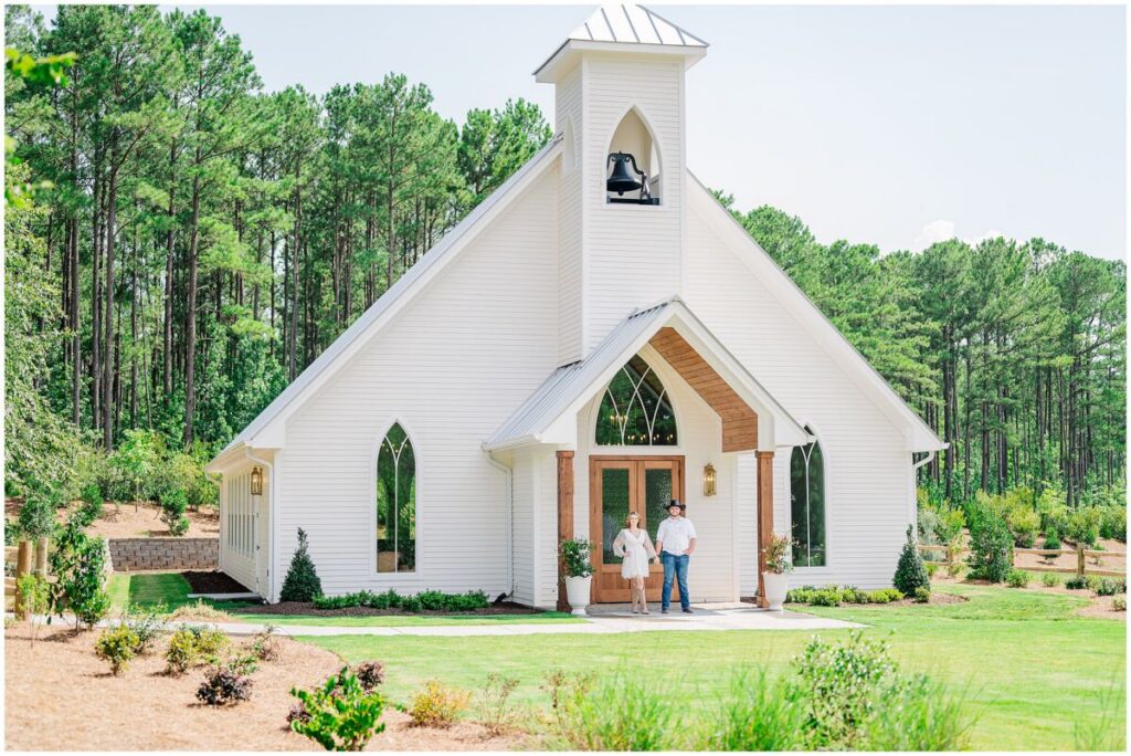 Glowing summer portraits at the chapel during a beautiful afternoon during a Pavilion at Carriage Farm engagement by JoLynn Photography