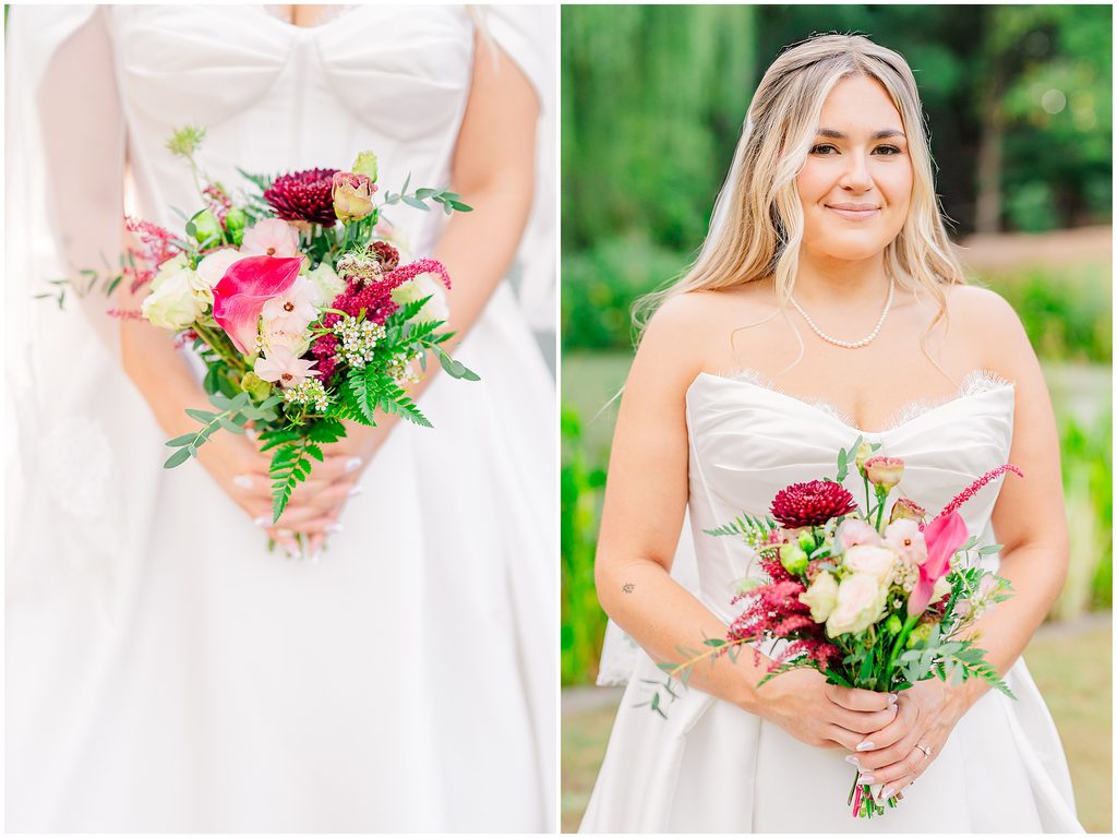A bride holding a warm pink and red bridal bouquet during her Duke Gardens bridal portrait session